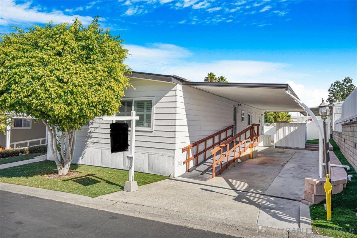 a house with trees in front of it