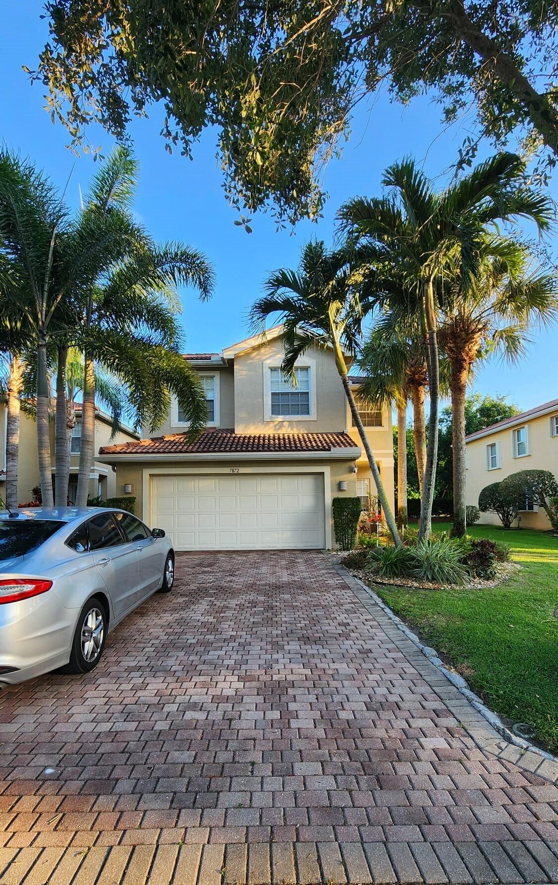 a house view with a garden space