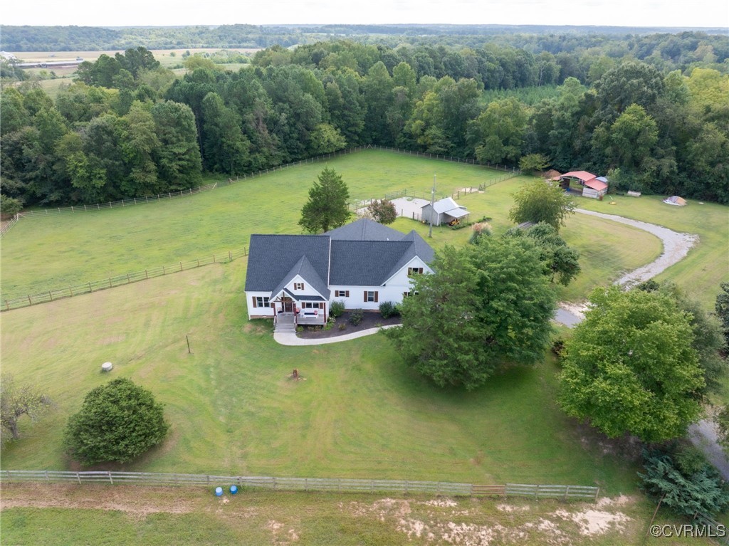 a view of a lake with a yard