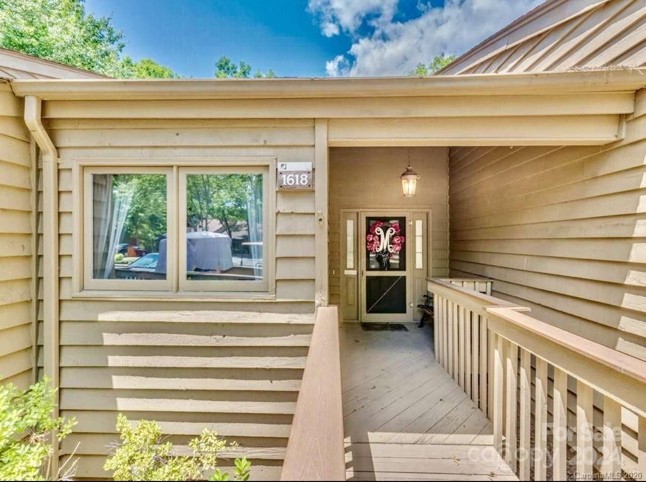 a view of a entryway door front of house