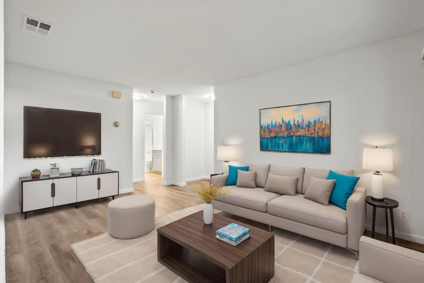 a living room with furniture and a flat screen tv