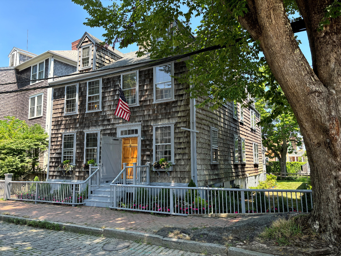 a front view of a house with a porch