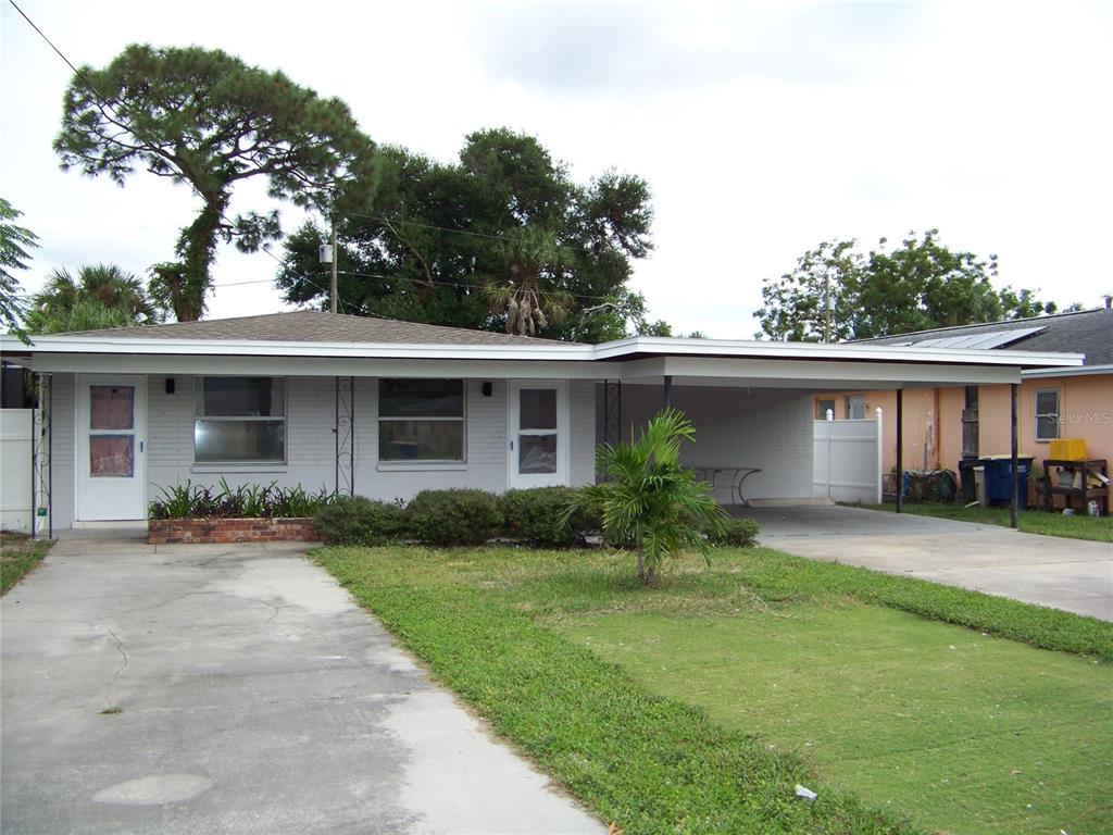 front view of a house with a yard