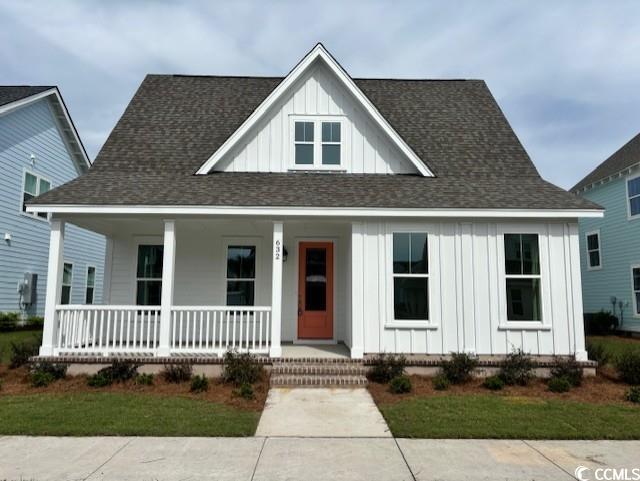 View of front of home featuring covered porch