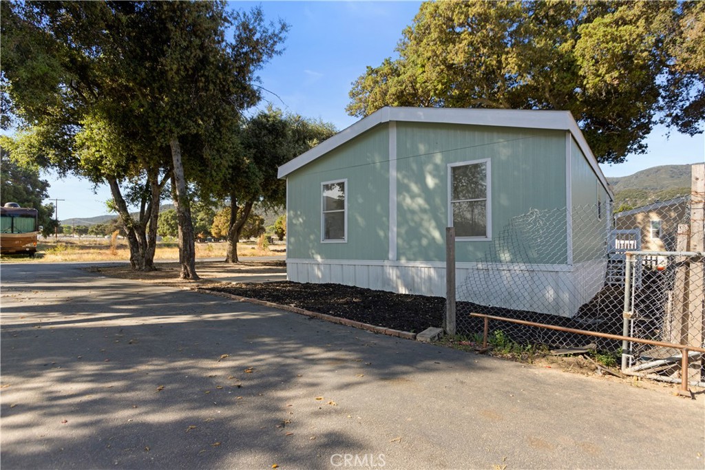 a house with trees in the background