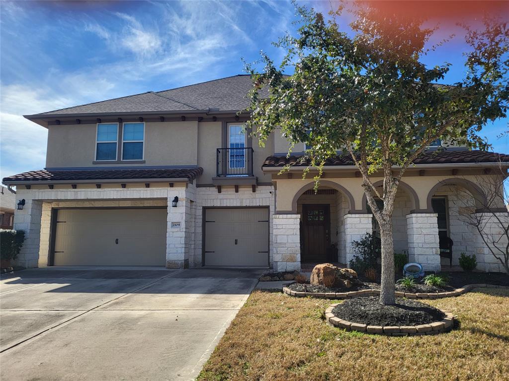 a front view of a house with entertaining space