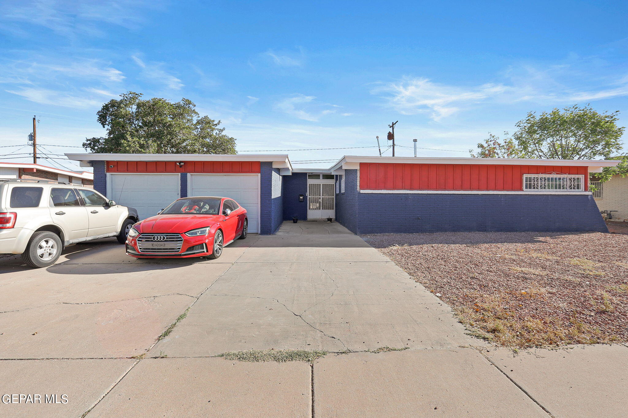 a car parked in front of a house