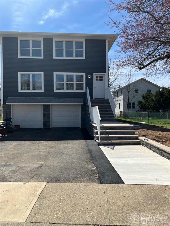 a front view of house with yard