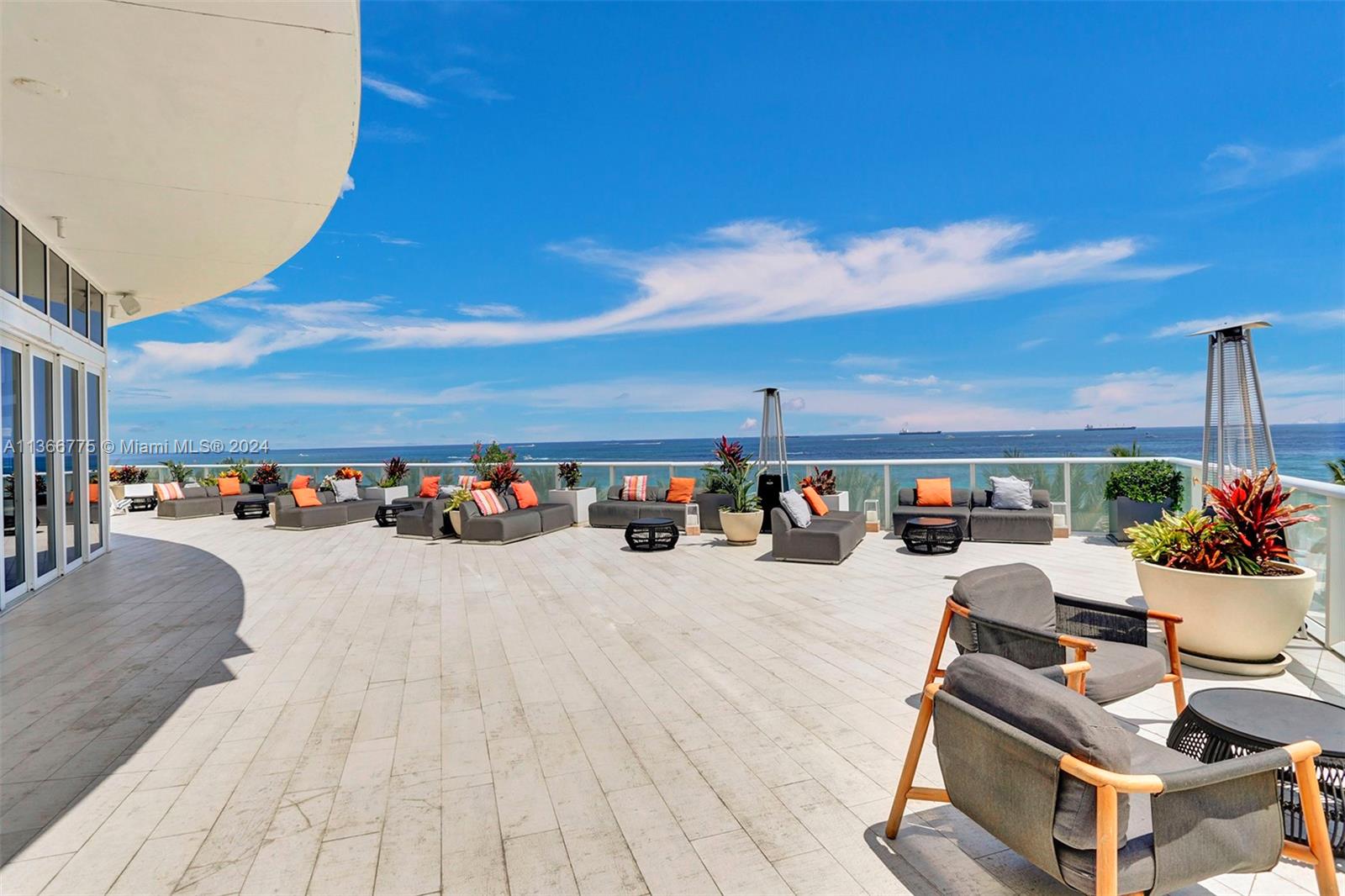 a view of a terrace with chairs