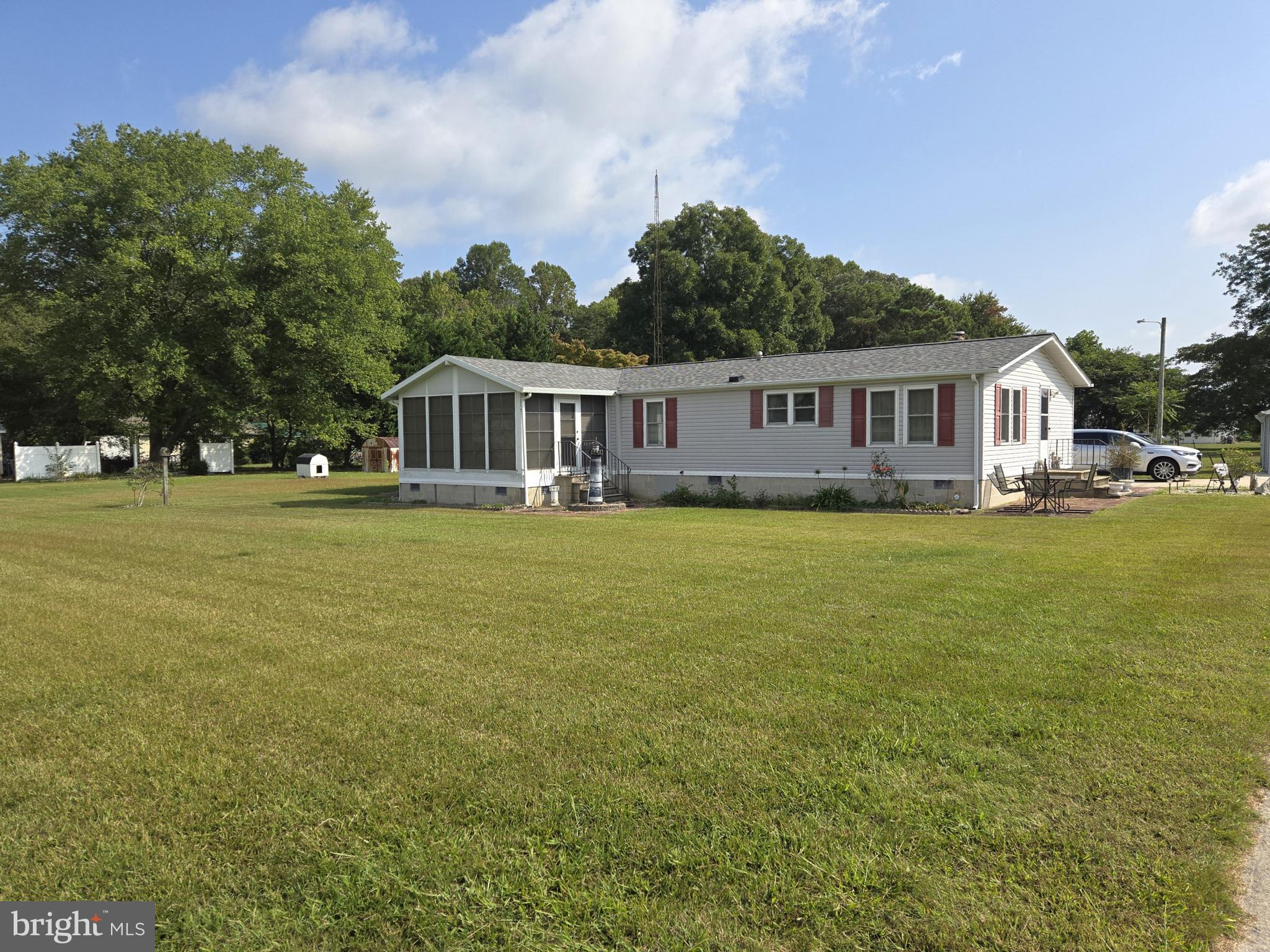 a view of a house with a big yard