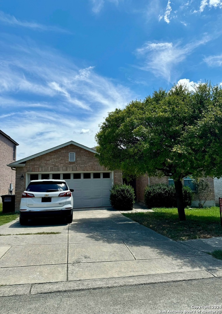 a car parked in front of a house