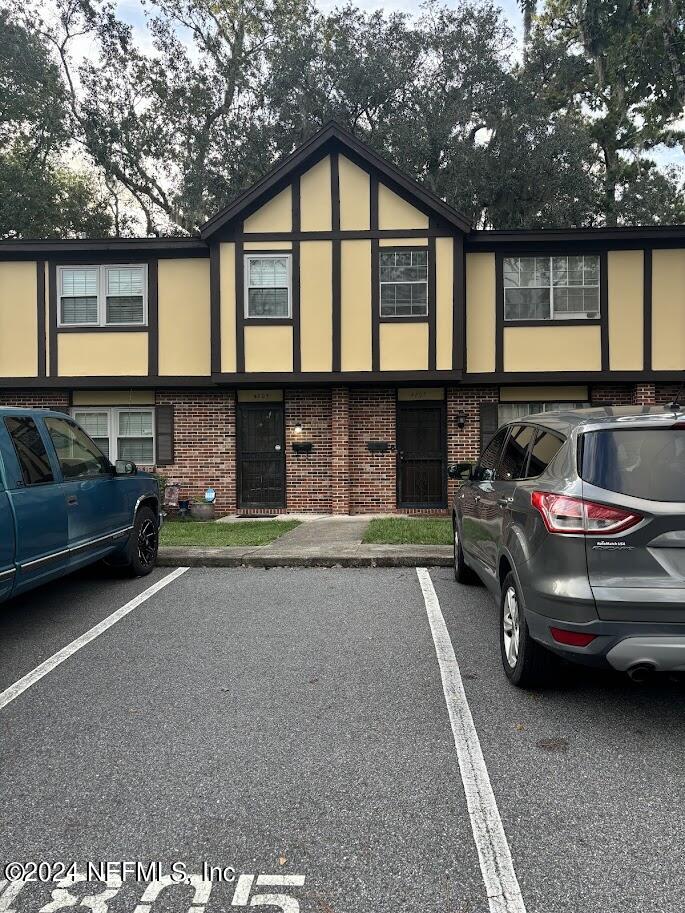 a car parked in front of a house