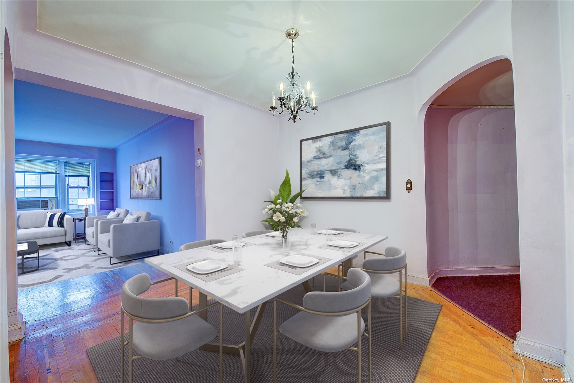 a view of a dining room with furniture and wooden floor