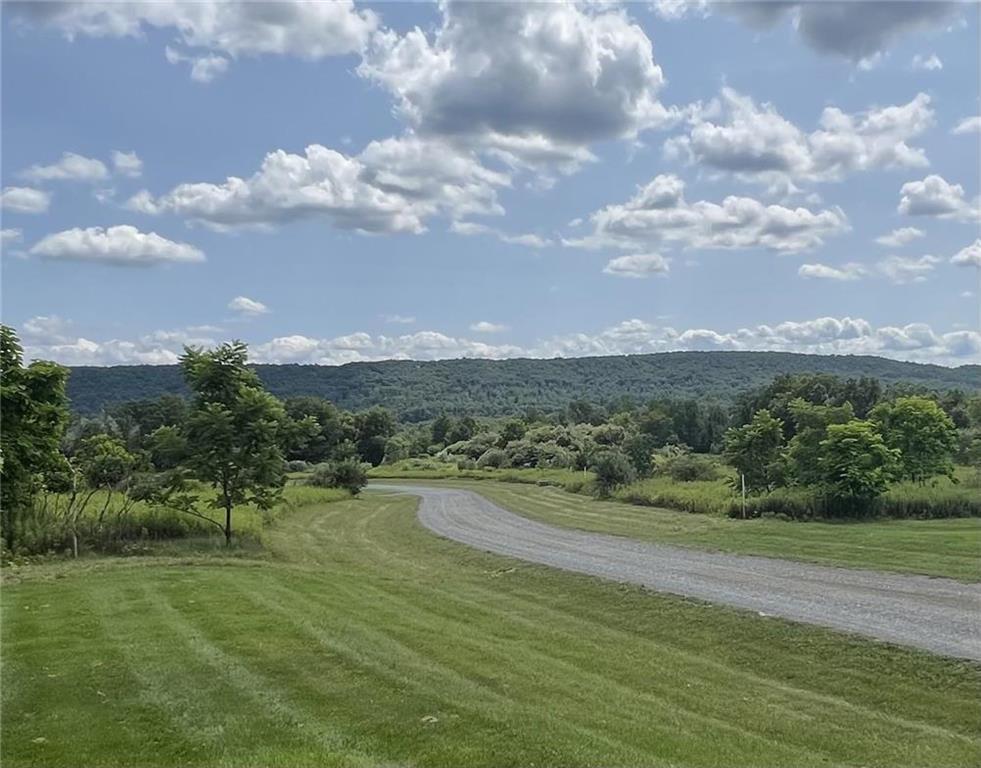 a view of a lake with a big yard