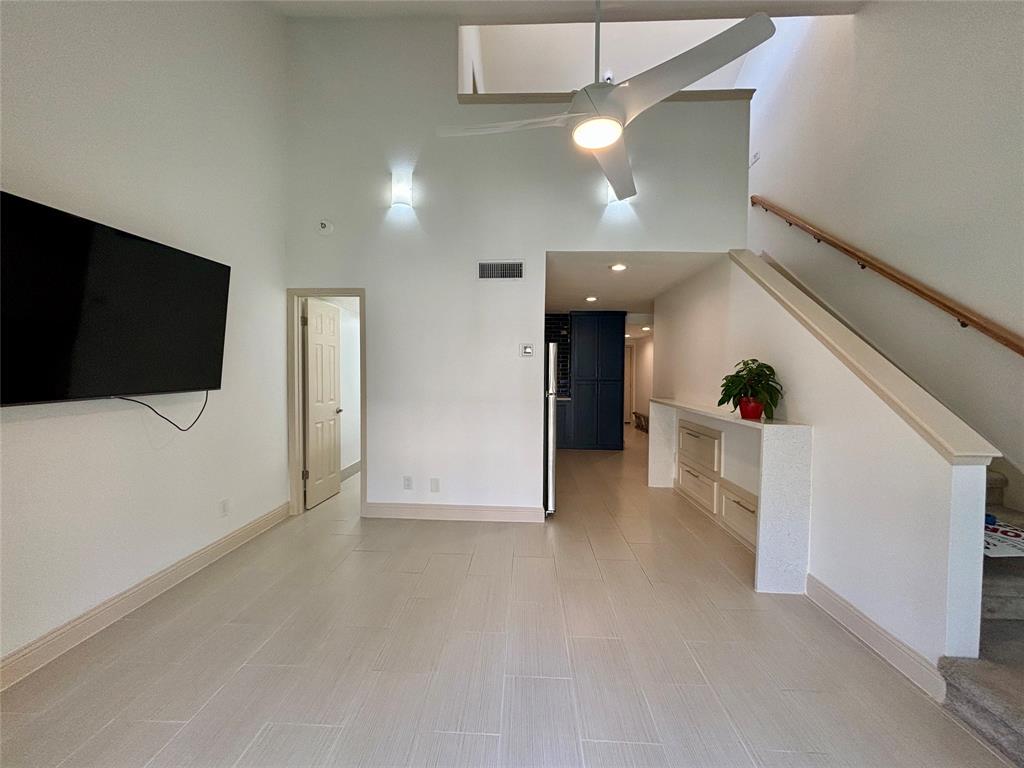 a view of a livingroom with a flat screen tv