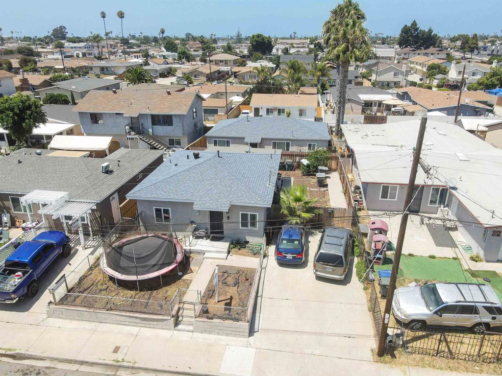 a view of multiple houses with outdoor space