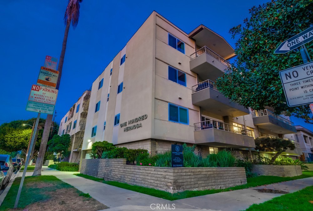 a view of building with yard