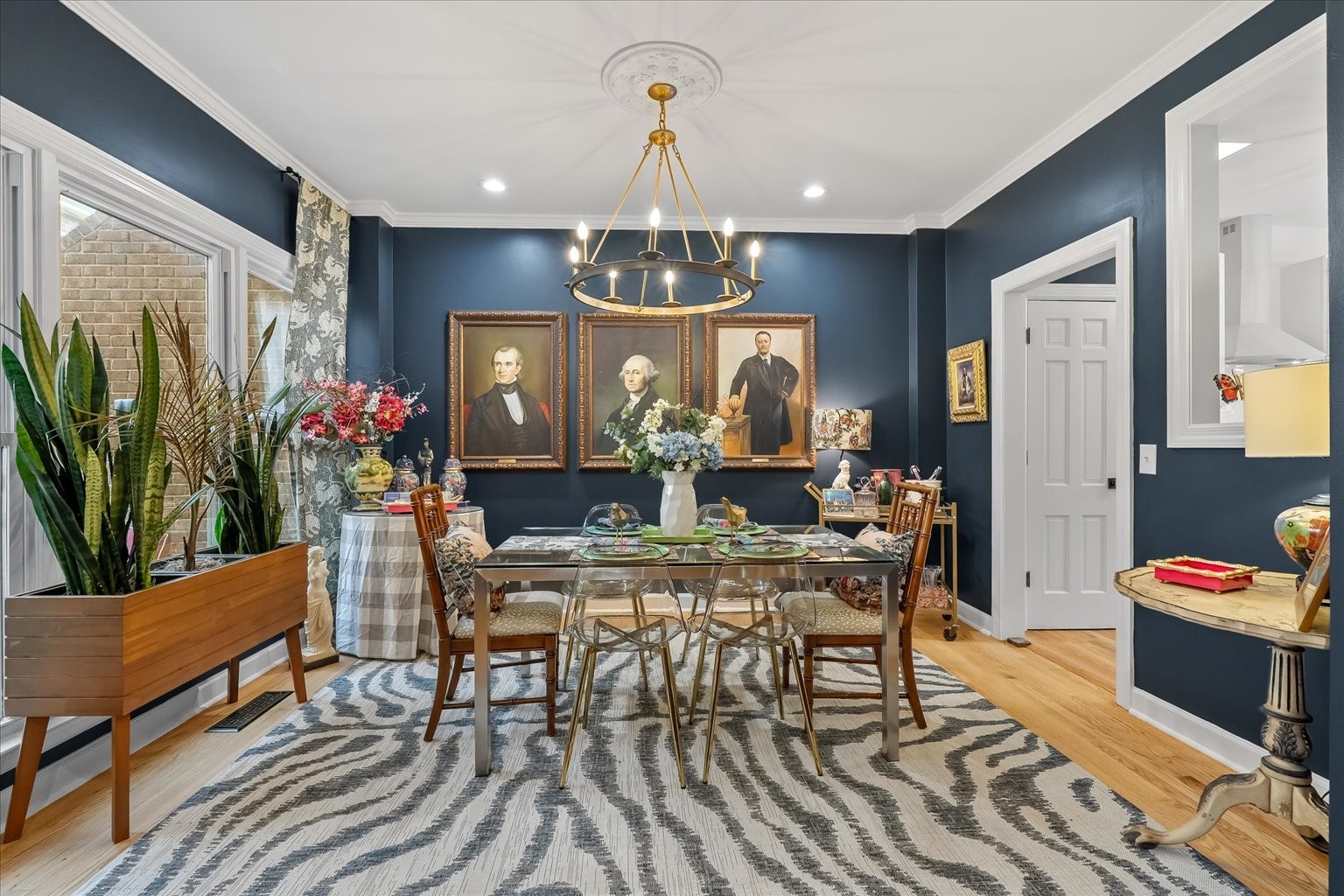 The gorgeous dining room is located just off the kitchen and interfaces beautifully with the main living area.