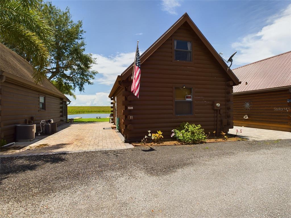 a view of a house with a yard and garage