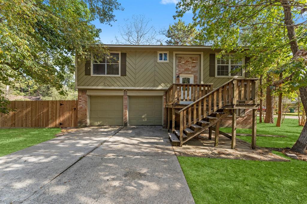 a house with yard in front of it