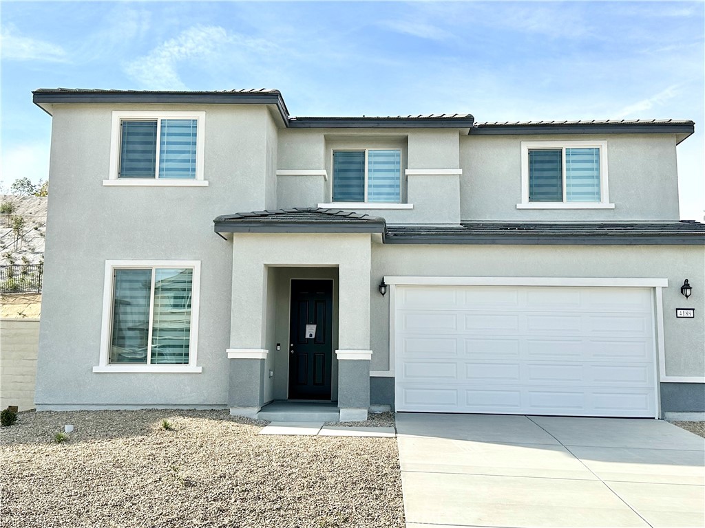 a front view of a house with an empty space