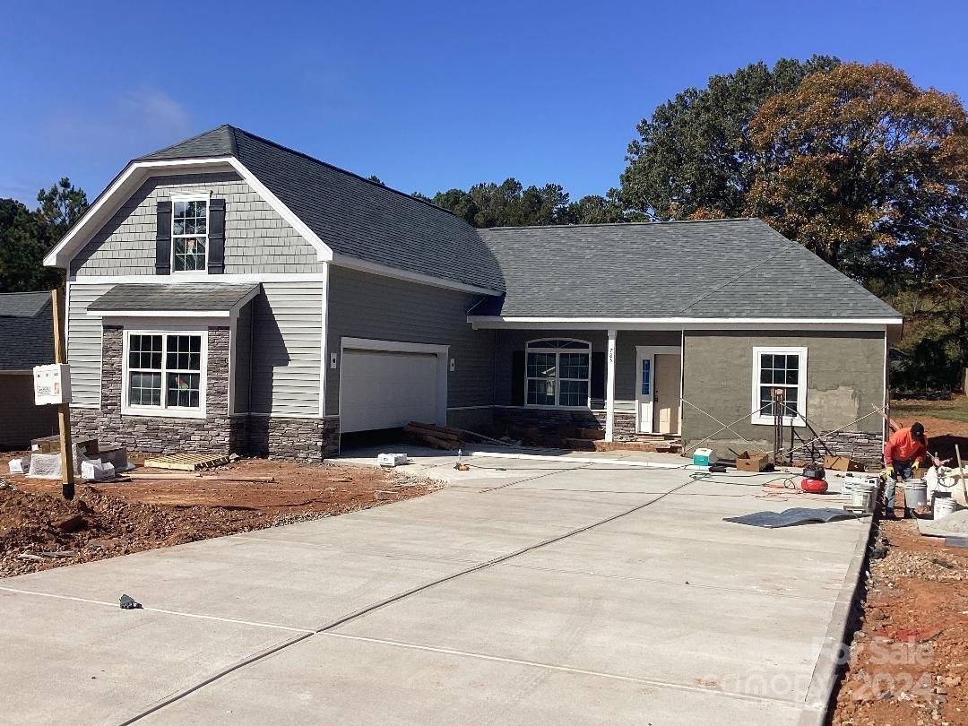 a front view of a house with a patio