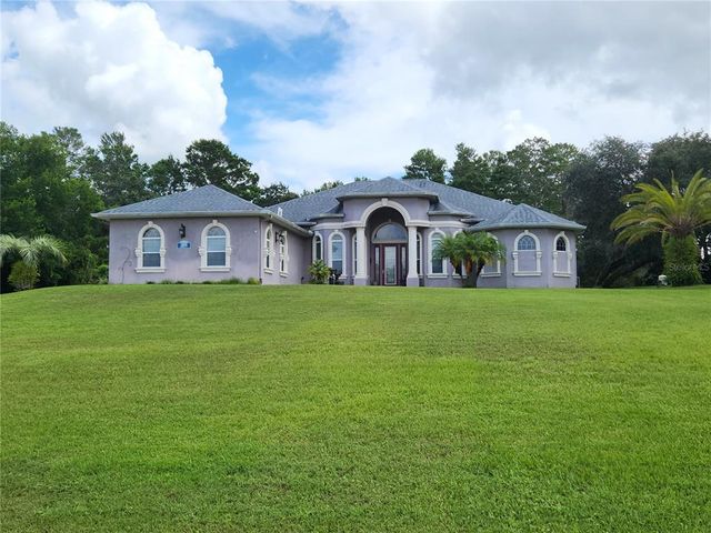 $890,000 | 11033 Baywind Court | Woodland Waters