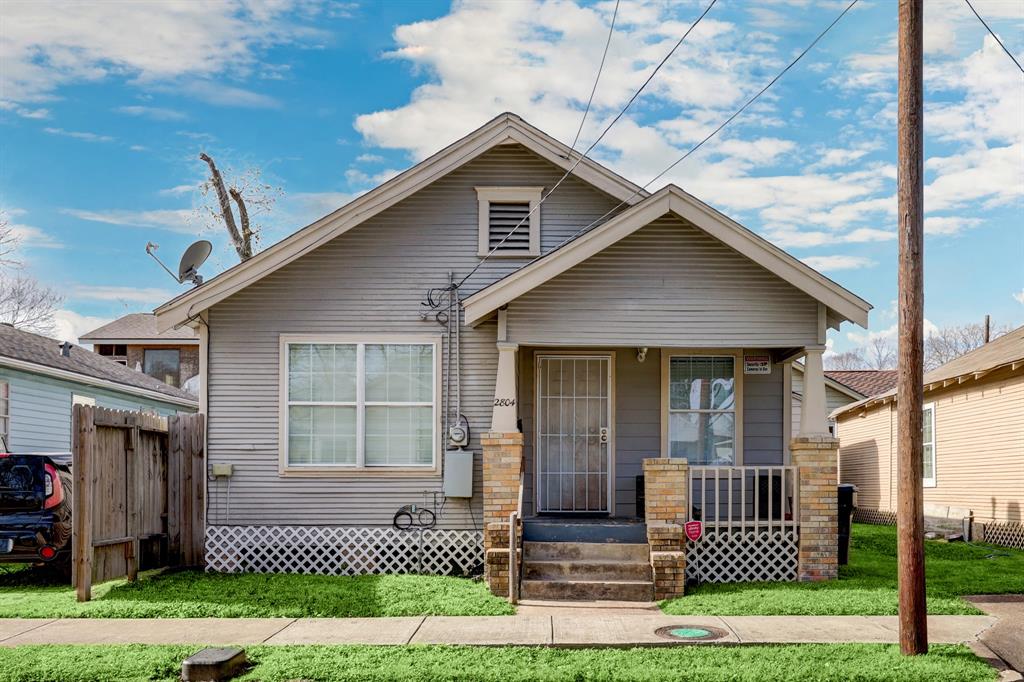 a front view of a house with a porch