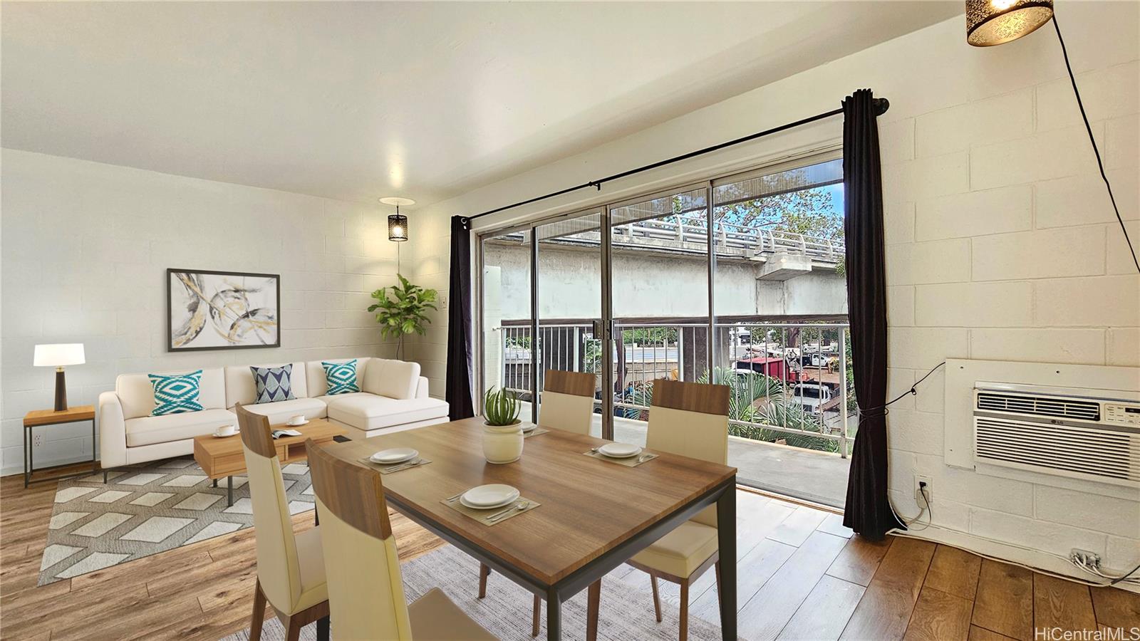 a view of a dining room with furniture window and wooden floor