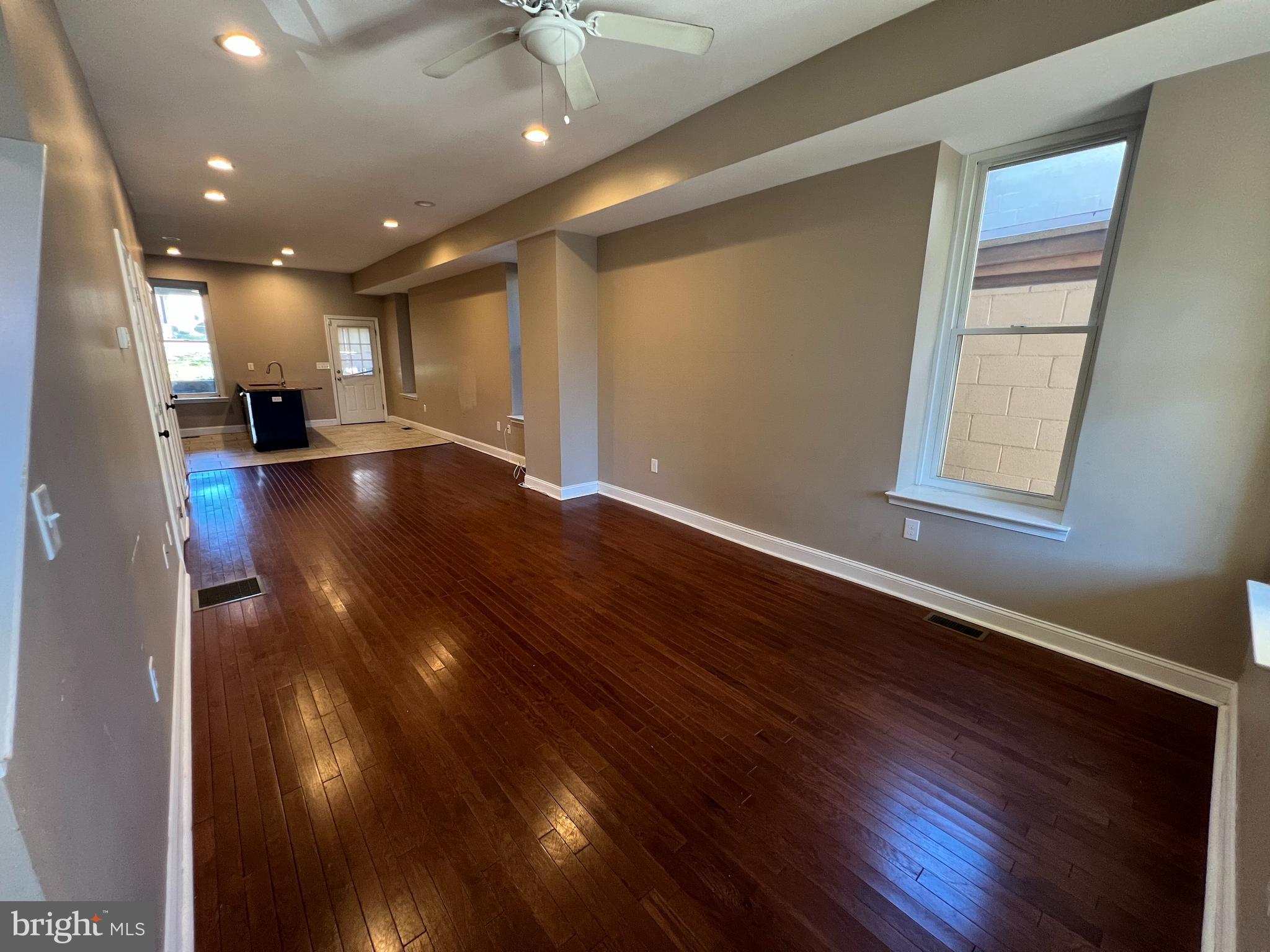 a view of livingroom and hardwood floor