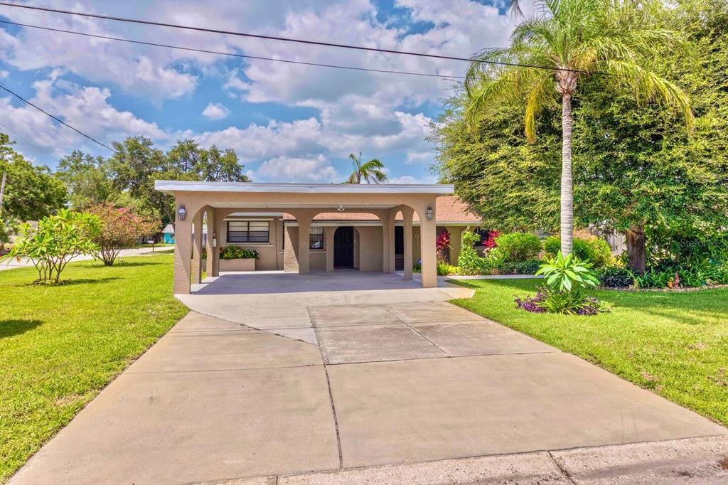 front view of a house with a yard