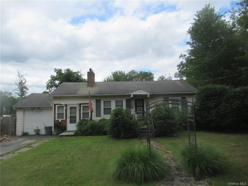 front view of house with a yard