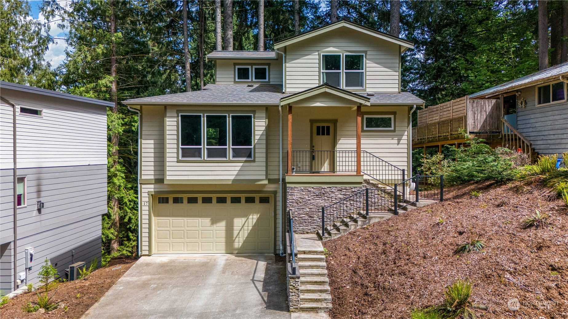 a front view of a house with a yard