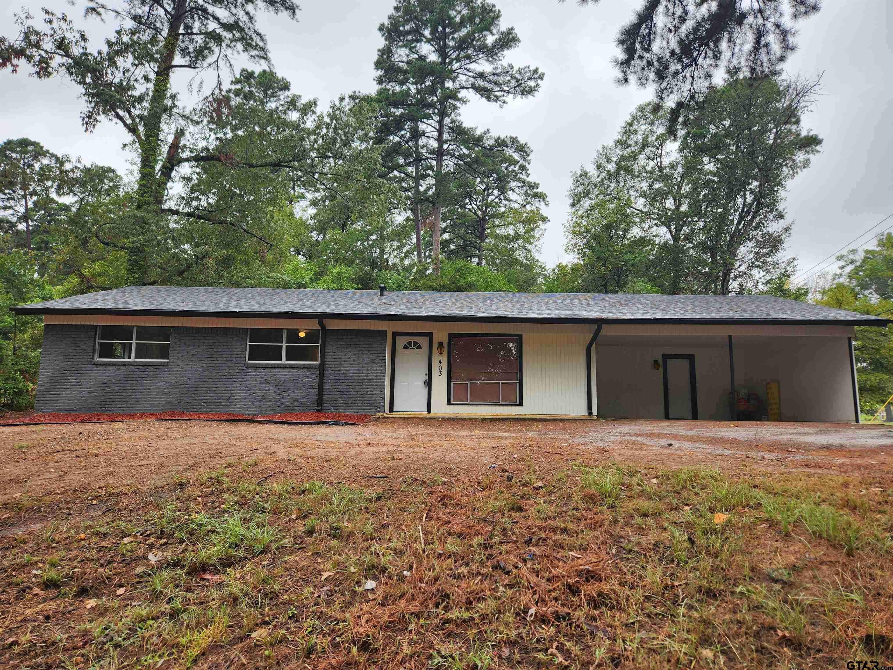 front view of house with a yard