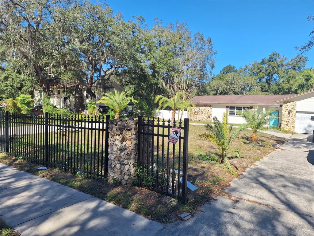 a view of a wrought iron fence