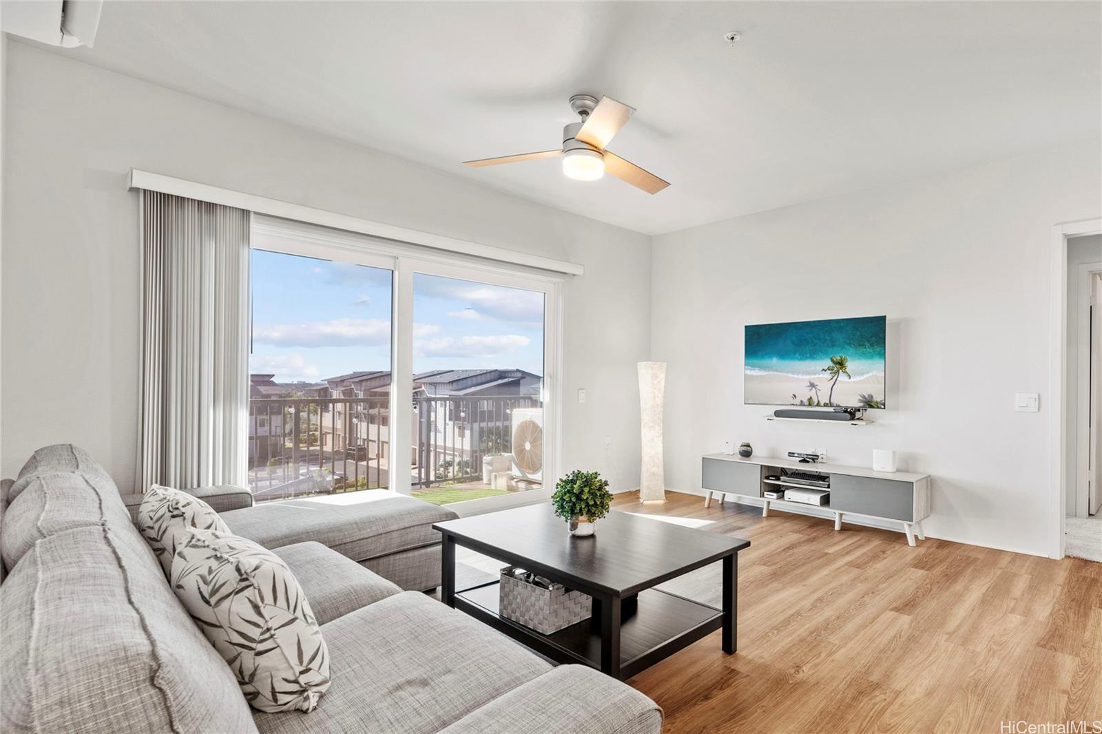 a living room with furniture and a window