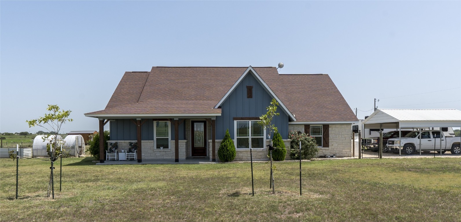 a front view of a house with a porch