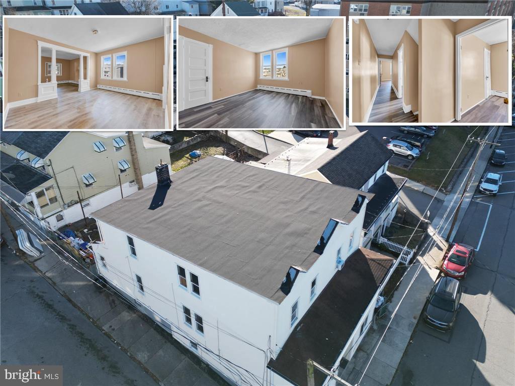 an aerial view of a house with outdoor space