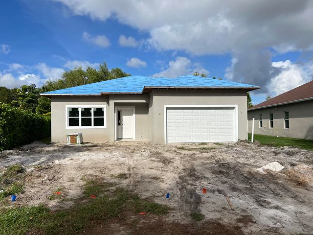 $535,000 | 675 Northeast Moss Rose Place | St. Lucie North