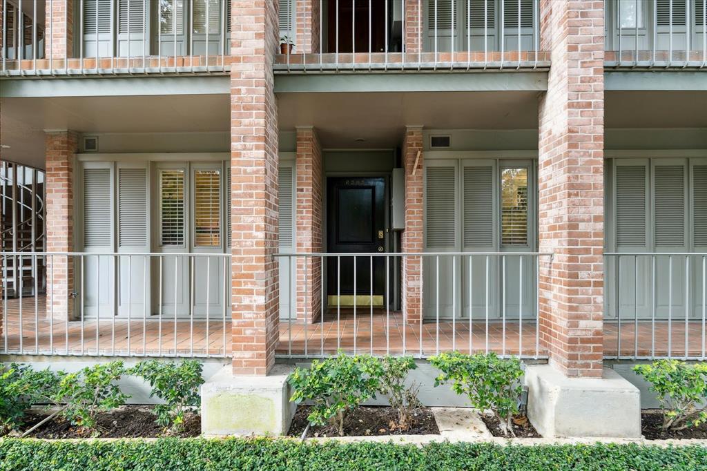 View of 6505 from sidewalk below. The corner location of this unit is superior with easy access to the stairs / elevator for transportation of groceries etc. plus nice view of the pool from the front windows.