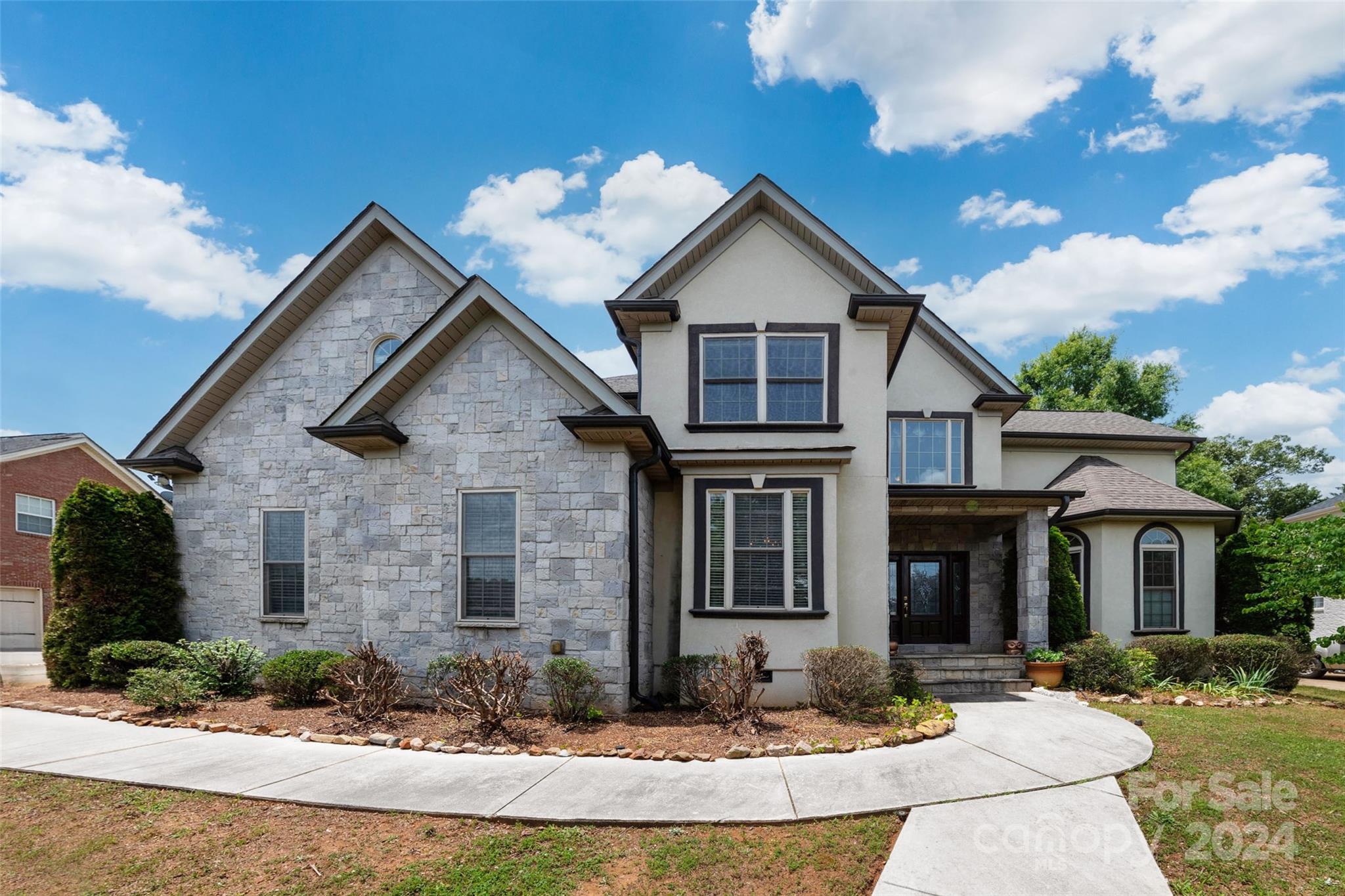 a front view of a house with entertaining space