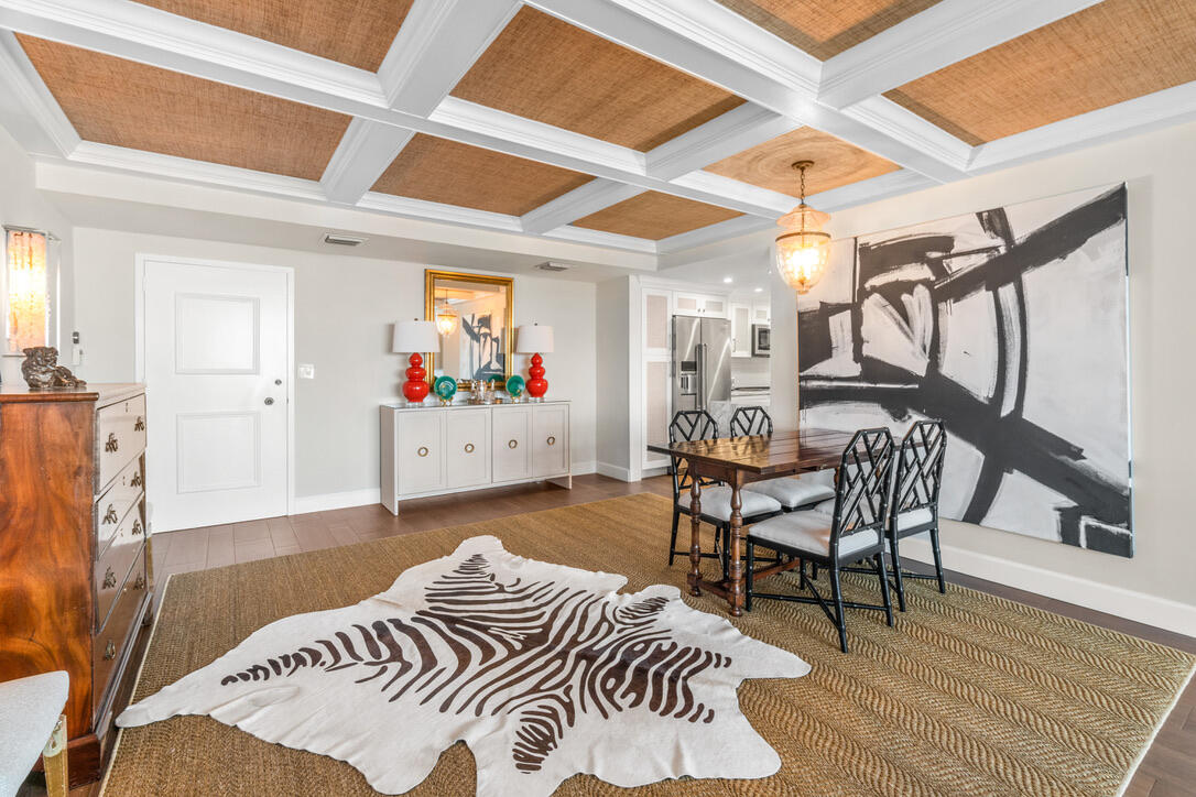 a bedroom with furniture and a wooden floor