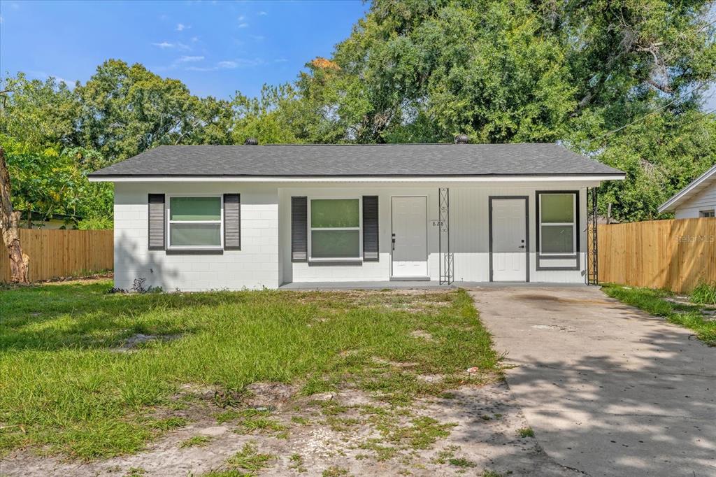 front view of a house with a yard