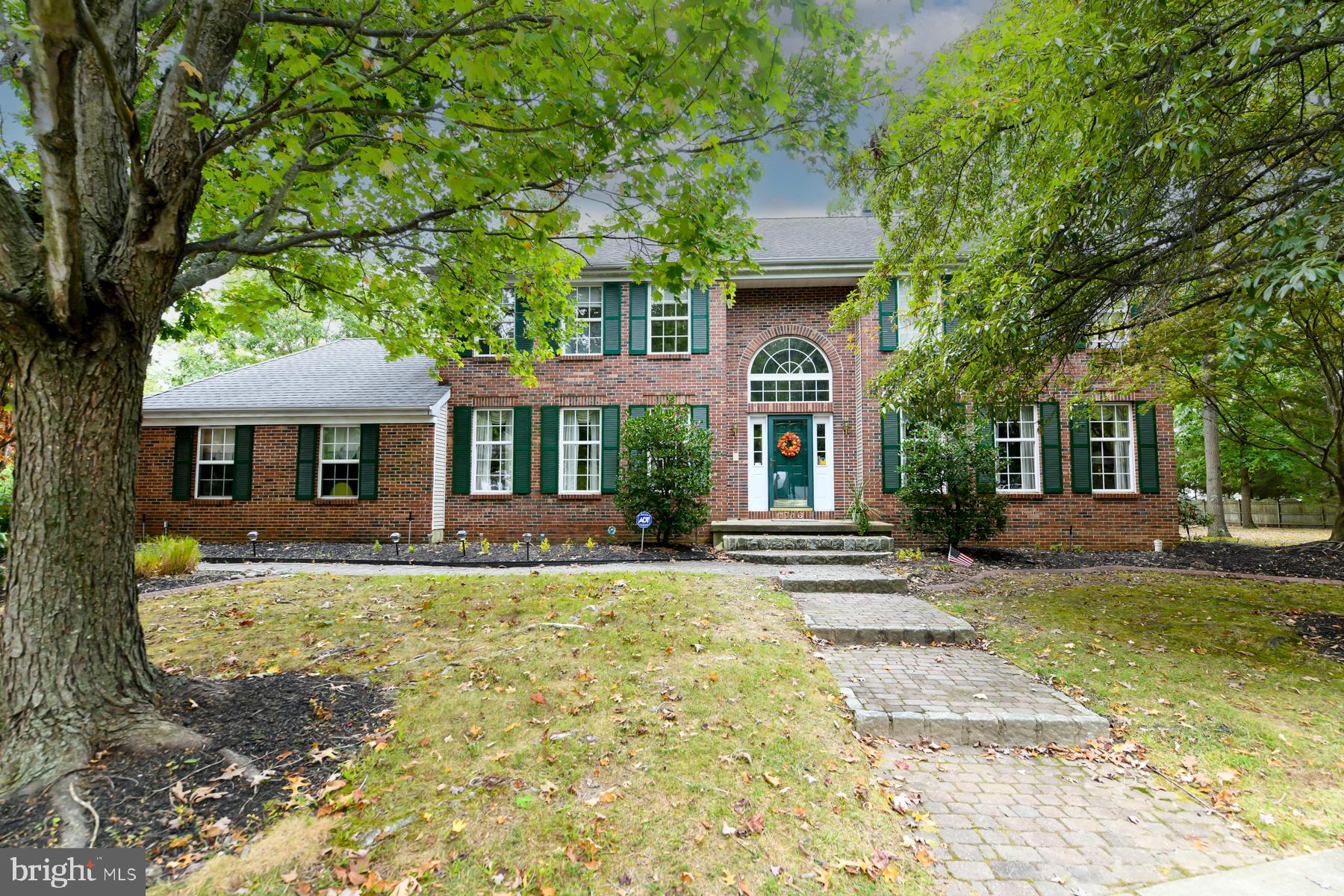 a view of a house with a swimming pool