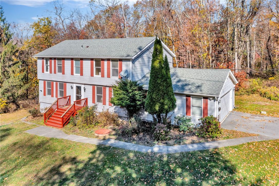 front view of house with a yard