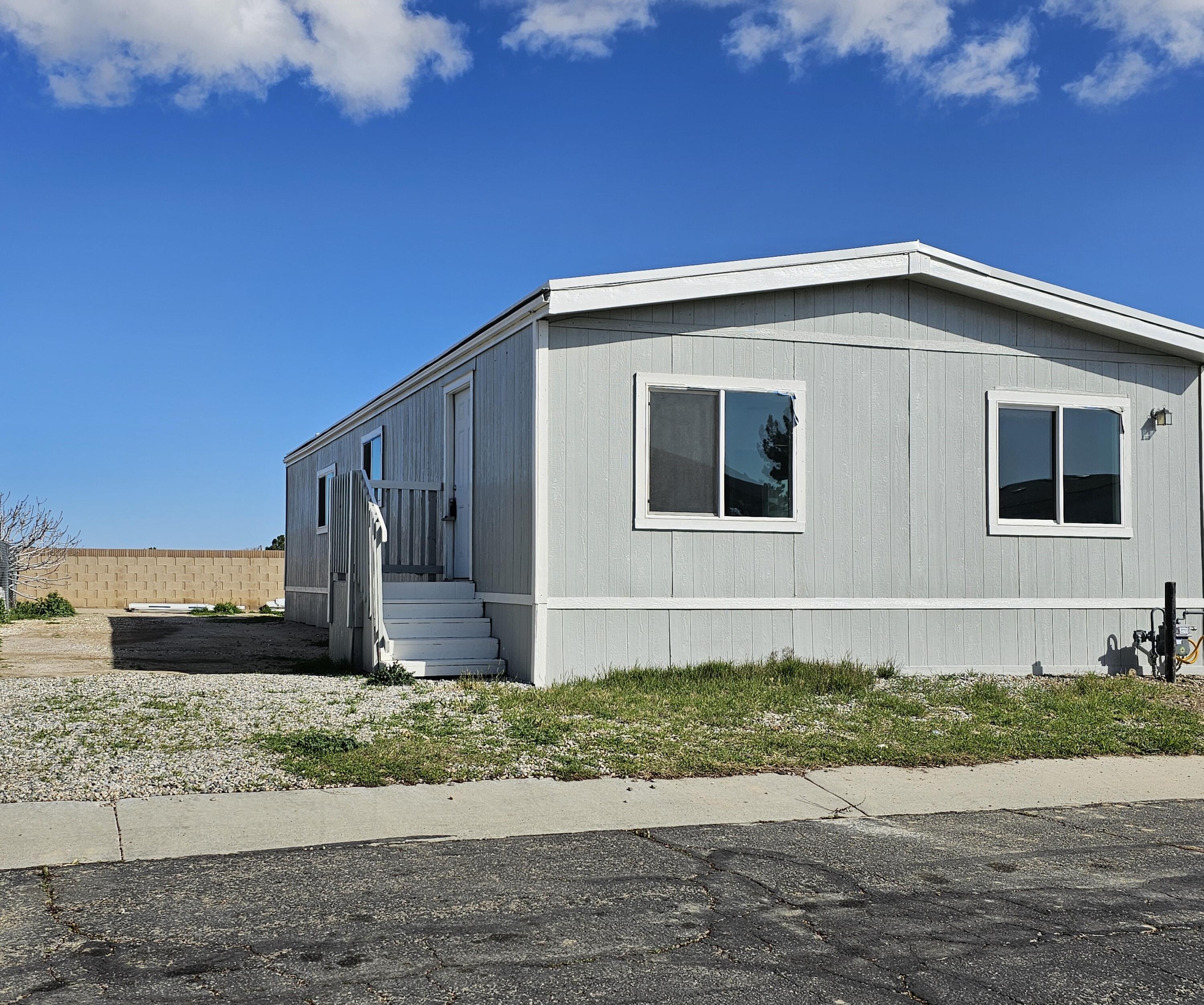 a front view of a house with garage