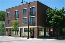 a street corner with a building in the background