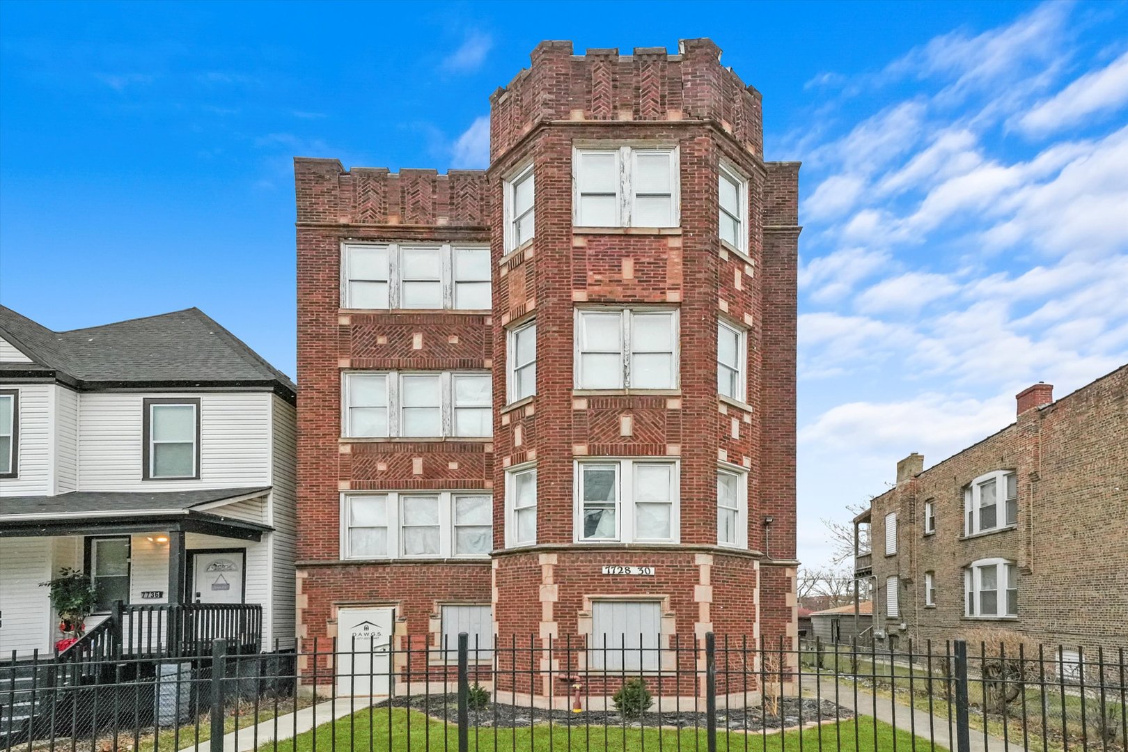 a front view of a brick building