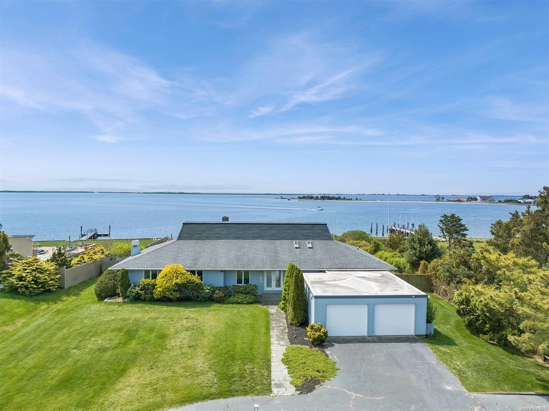 an aerial view of a house with a garden