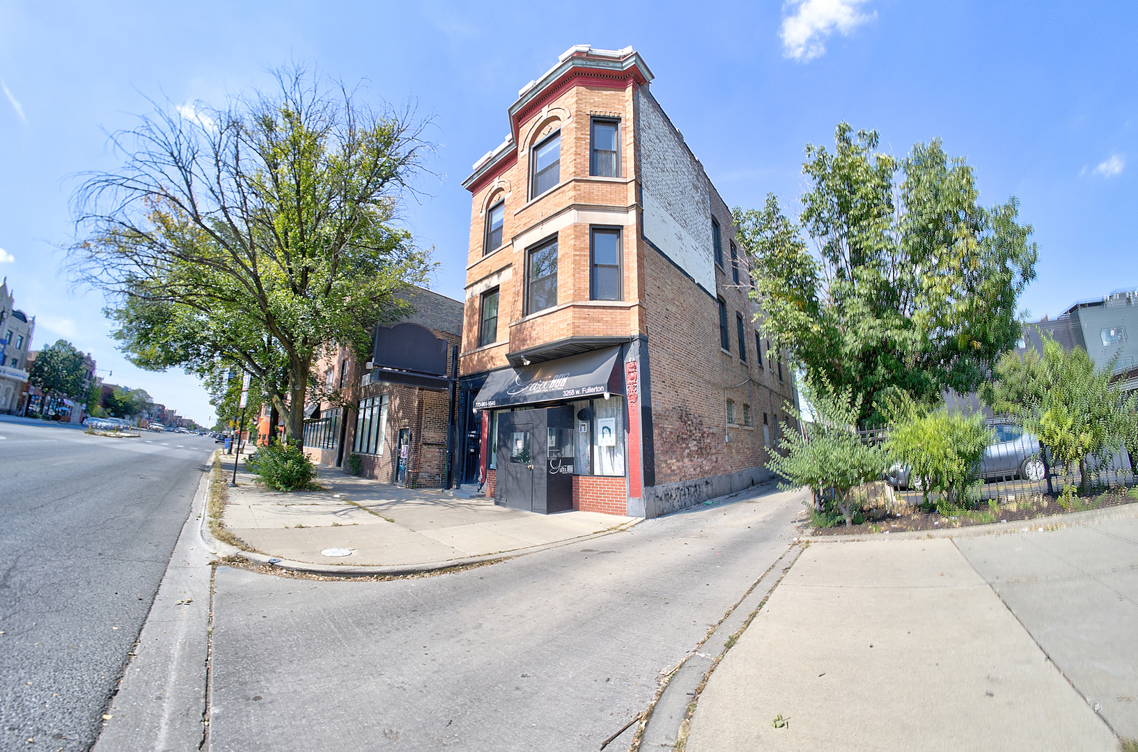 a view of a building with a street